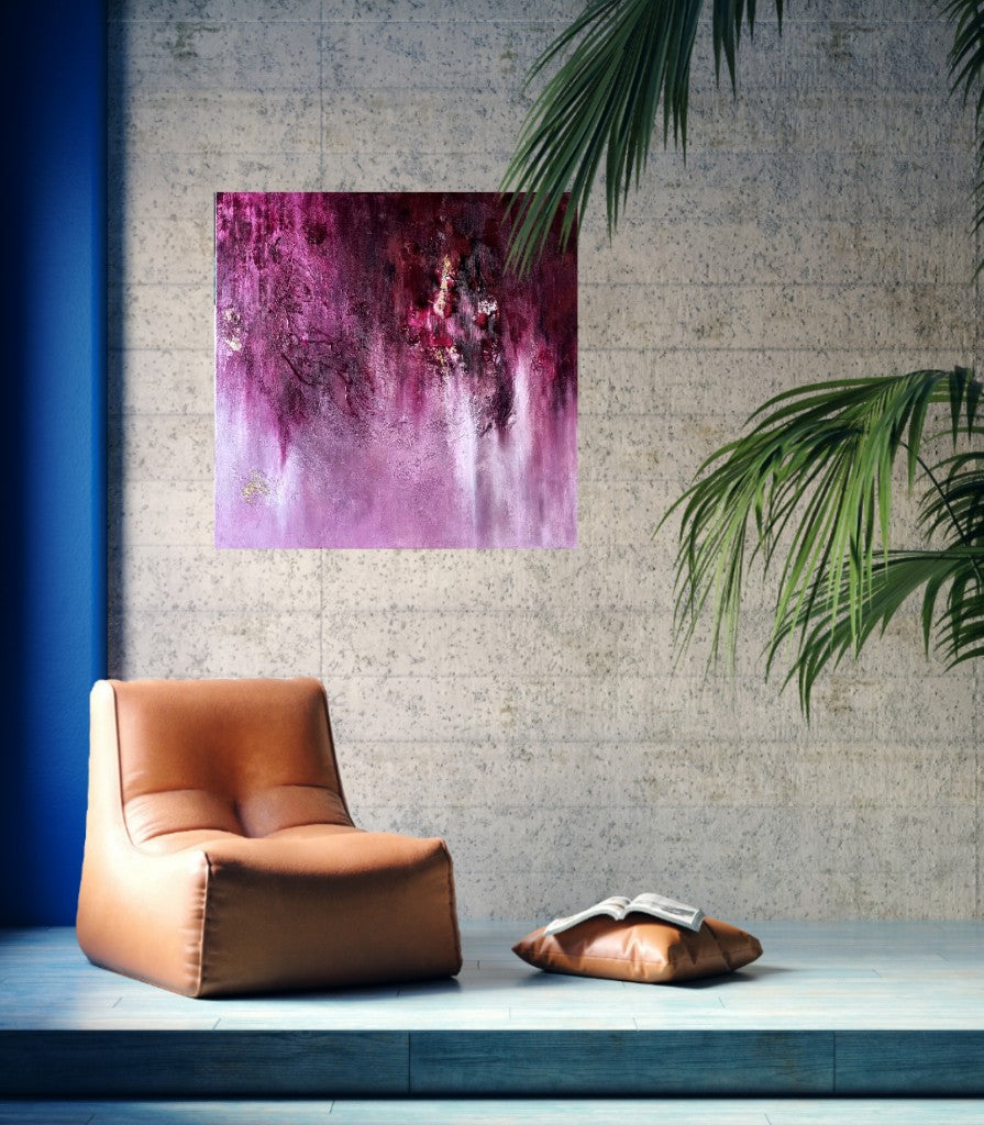 Abstract pink painting displayed in a loft apartment with industrial details and natural light.